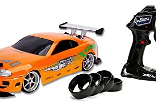 Jada Toys Fast & Furious RC Auto Drift 1995 Toyota Supra Turbo-Coche teledirigido con 2 Canales, función de Carga USB, 4 neumáticos de Repuesto, Incluye Pilas, 1:10, Color Naranja (253209003)