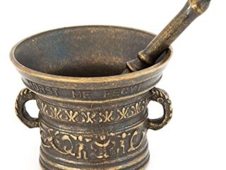 Reproducción de un mortero antiguo con mano de mortero de bronce de farmacéutico